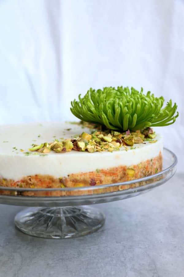 raw carrot cake with pistachios and lime coconut frosting (grain-free & vegan)