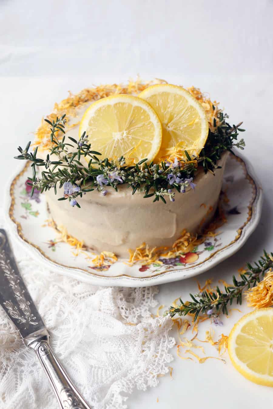 Lemon olive oil cake brushed with rosemary honey syrup, filled with lemon  curd, lightly covered in vanilla bean Italian buttercream : r/Baking